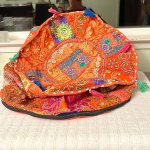 Embroidered footrest.